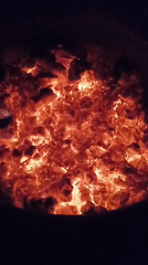 Evening fire pit gathering documented in Viadana, Italy