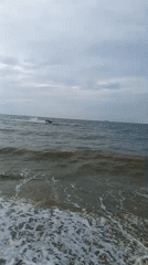 Jet ski out on choppy Pattaya waters on a cloudy morning