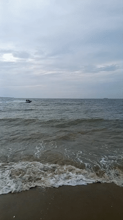 Jet ski out on choppy Pattaya waters on a cloudy morning