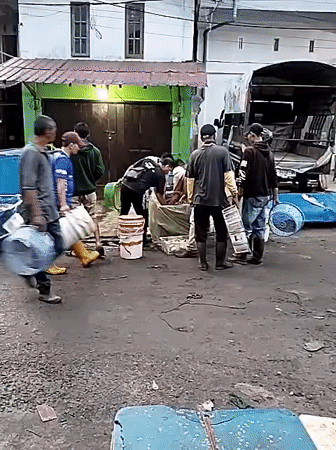 Late night fish market activity documented in Lhokseumawe, Indonesia