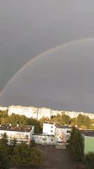 Double rainbow over Cherkasy skyline after summer rain