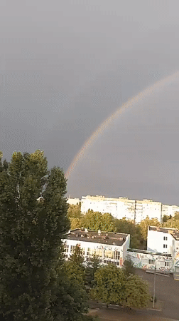 Double rainbow over Cherkasy skyline after summer rain