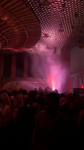 Late-night club scene captured in smoky New York venue