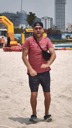 Man stands at beach event start line in Vietnam
