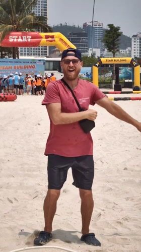 Man stands at beach event start line in Vietnam