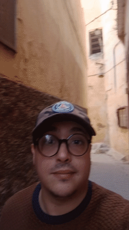 Tourist explores historic Meknes medina and traditional markets