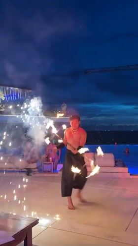 Poolside fire show and DJ night in Karon, Thailand