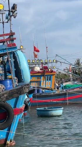 Colorful fishing fleet docked in Nha Trang harbor