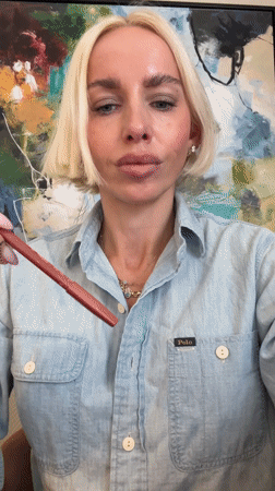 Woman poses for makeup and jewelry photos in Sweden