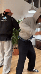 Young men gather for evening of dancing, games in Saint-Denis home