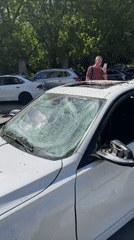 Vehicle damage and crater documented in Kyiv Ukraine