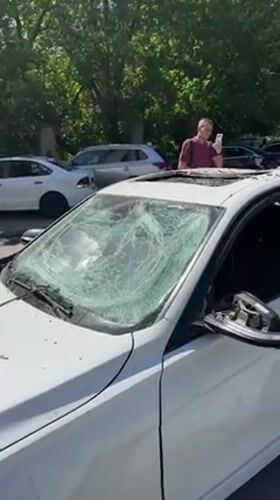 Vehicle damage and crater documented in Kyiv Ukraine