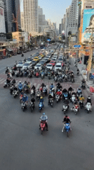 Rush hour traffic congestion observed at Bangkok's Asok intersection