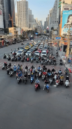 Rush hour traffic congestion observed at Bangkok's Asok intersection
