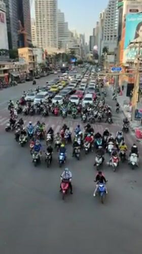 Rush hour traffic congestion observed at Bangkok's Asok intersection