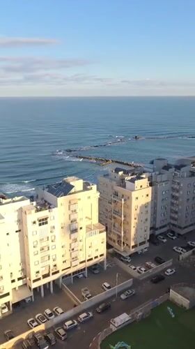 Aerial footage captures Bat Yam coastal apartments at dawn