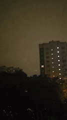 Thunderstorm strikes Khimki cityscape at night