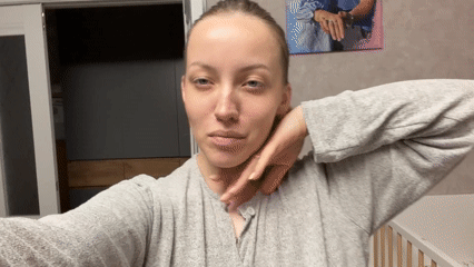 Woman records selfie video in Reshetnikovo, Russia