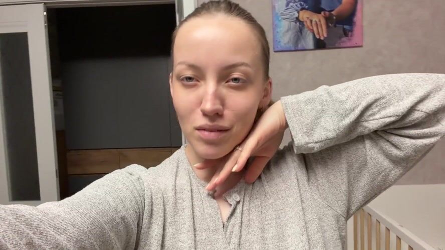Woman records selfie video in Reshetnikovo, Russia