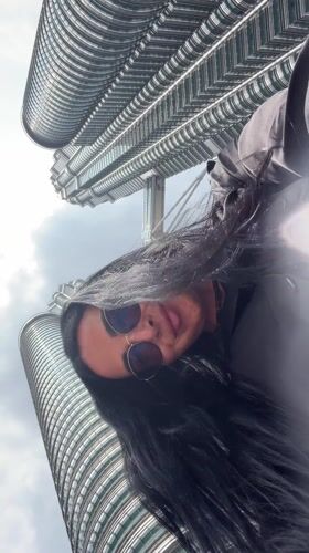 Early morning tourist activities documented around Petronas Twin Towers