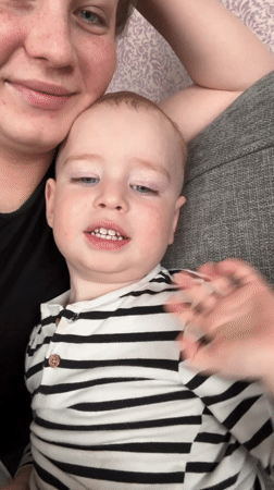 Mother and child share quiet morning moment in Russia