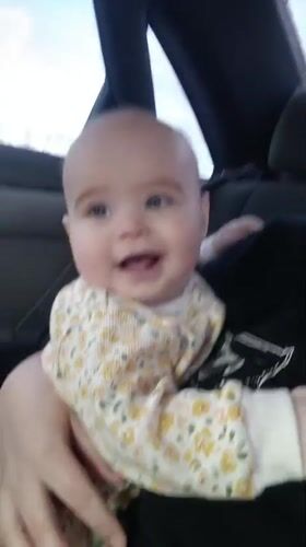 Baby held by adult captured in car video, Gorodishche