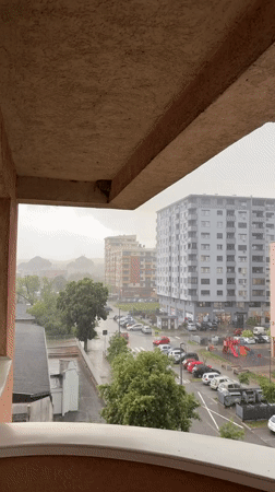 Rainy afternoon captured from balcony view in Kragujevac, Serbia