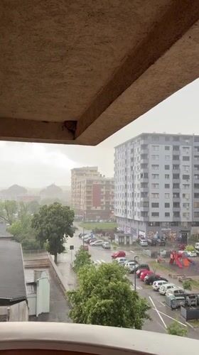 Rainy afternoon captured from balcony view in Kragujevac, Serbia