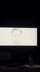 Screen displays transitioning imagery in Zaslawye, Belarus
