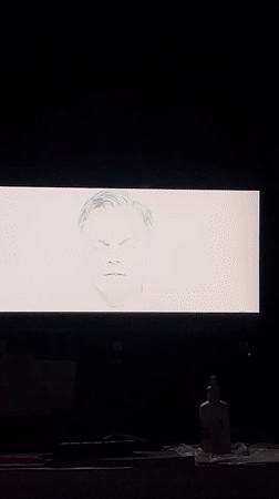 Screen displays transitioning imagery in Zaslawye, Belarus