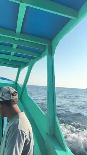 Aboard a turquoise boat off Lombok's north coast