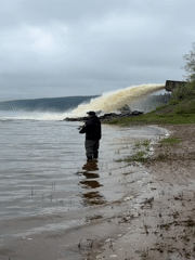 Early morning fishing and barge traffic near Ольховка, Russia