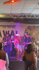 Live band performs in Fuengirola with dynamic stage lighting