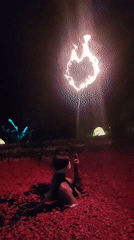 Blindfolded fire dancer performs nighttime show in Blahbatuh, Indonesia