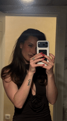 Woman documents skincare routine in Budva bathroom
