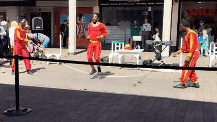 Acrobatic street crew performs jump rope and balancing acts in Knowsley
