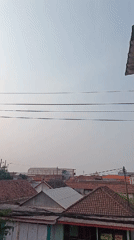 Morning street and rooftop life in a Kwangsan residential neighborhood