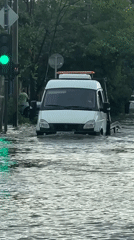 Flooding submerges vehicles on Krasnodar streets, residents wade through water