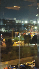 A night out in Kadıköy, streets lit and wine in hand.