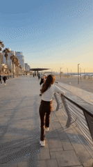 Tel Aviv waterfront captures casual moments, selfies during sunset hours