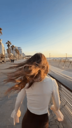 Tel Aviv waterfront captures casual moments, selfies during sunset hours