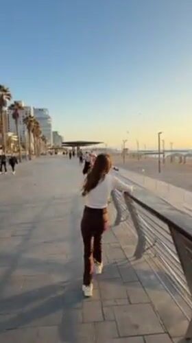 Tel Aviv waterfront captures casual moments, selfies during sunset hours