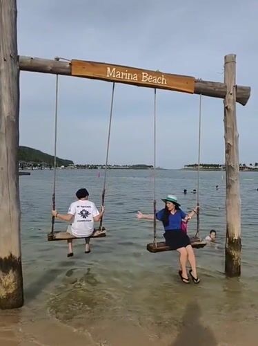 Morning beach activities captured at Marina Beach Nha Trang