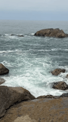 Fishing from the rocks on Gaia's Atlantic coastline