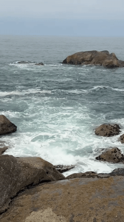 Fishing from the rocks on Gaia's Atlantic coastline