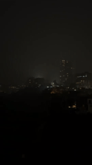 Late night observations in Huixquilucan include foggy cityscape, indoor TV