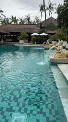 Rainy night at Indonesian resort pool captured by witness