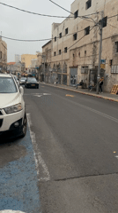 Morning street life and pet encounters across Tel Aviv