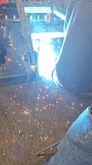 Welder works on industrial machinery in Karnobat, Bulgaria