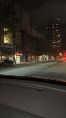 Orange Lamborghini spotted crossing Vancouver intersection at dawn